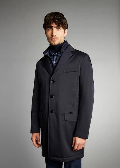 Eleganza e funzionalità per questo modello Double Coat di giaccone stile italiano scuro