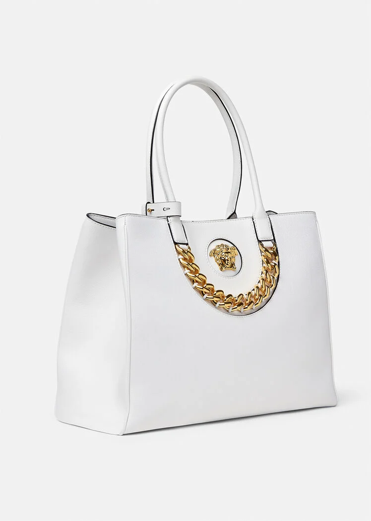 borsa colore bianco e metalleria dorata di Versace
